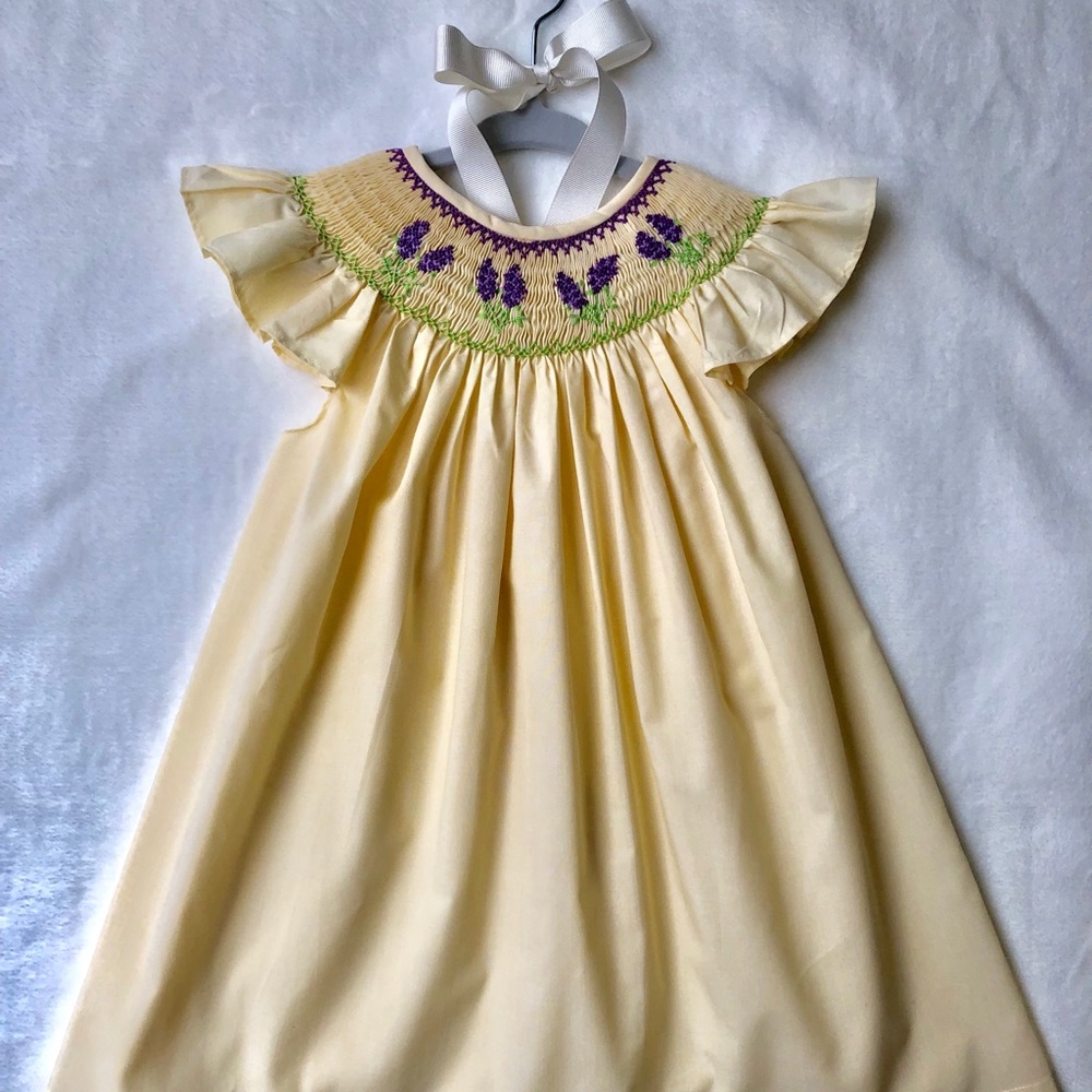 SOLD Beautiful smocked wild flowers yellow dress